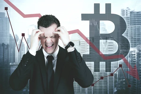 Stressed manager with bitcoin symbol — Stock Photo, Image