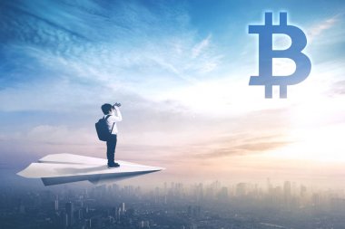 Küçük çocuk bitcoin sembolü seyir