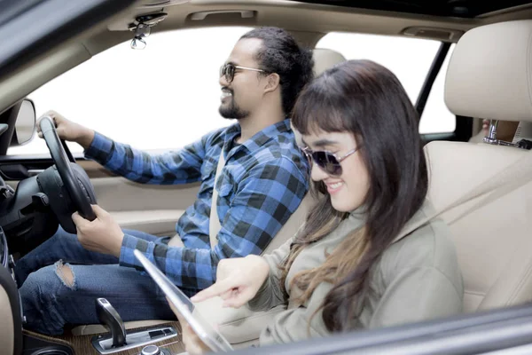 Young couple enjoying road trip