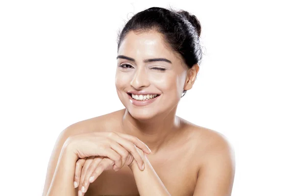 Playful Indian woman winks to camera — Stock Photo, Image