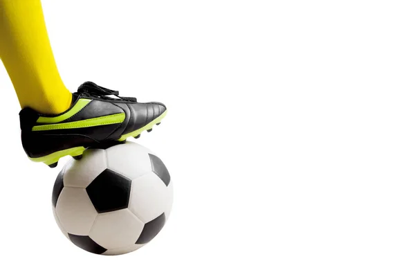 Soccer player feet kicking soccer ball — Stock Photo, Image