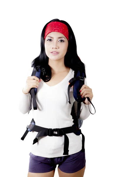 Hispanic female traveler with backpack — Stock Photo, Image