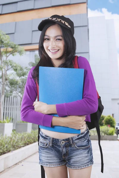 Beautiful student with backpack and folder — Stock Photo, Image