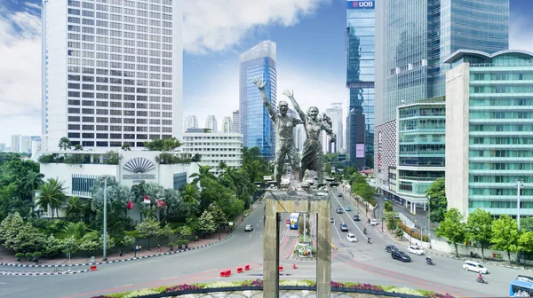 Üdvözöljük a szobor központi üzleti — Stock Fotó
