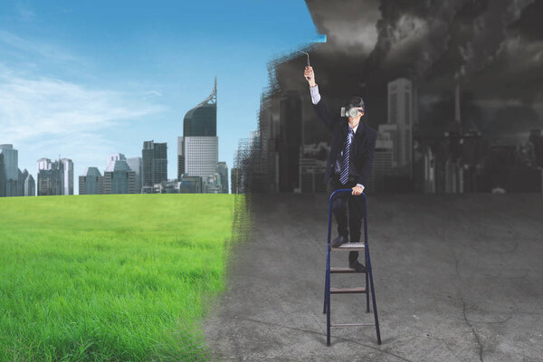 Businessman with mask creating a better working environment picture