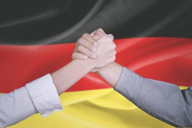 Business team hands with German flag clipart