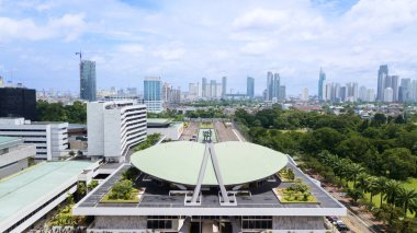 Aerial Image of the Indonesia Parliament Complex with Jakarta Cityscape clipart