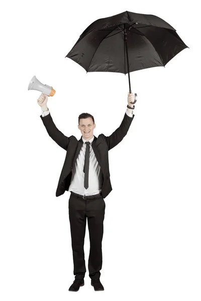 Caucasian businessman with megaphone and umbrella — Stock Photo, Image