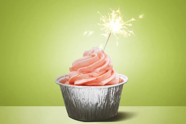 Birthday cupcake with fireworks — Stock Photo, Image