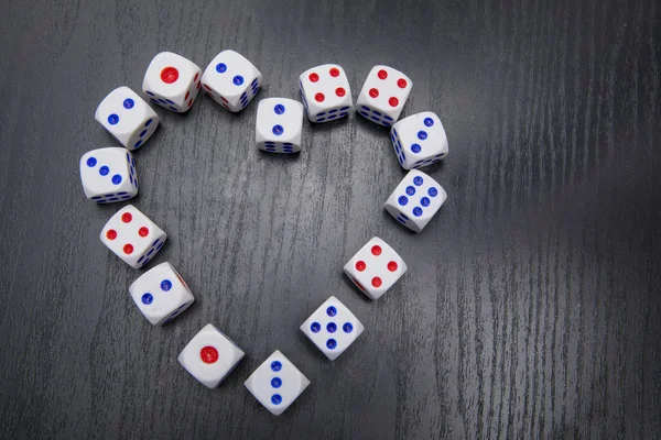 White dices shaped a symbol of heart — Stock Photo, Image