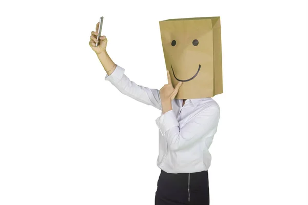 Unknown female entrepreneur taking photo on studio — Stock Photo, Image