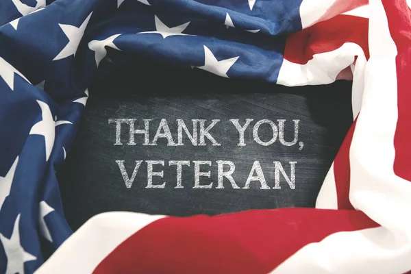 Handwriting of thank you, veteran with American flag — Stock Photo, Image