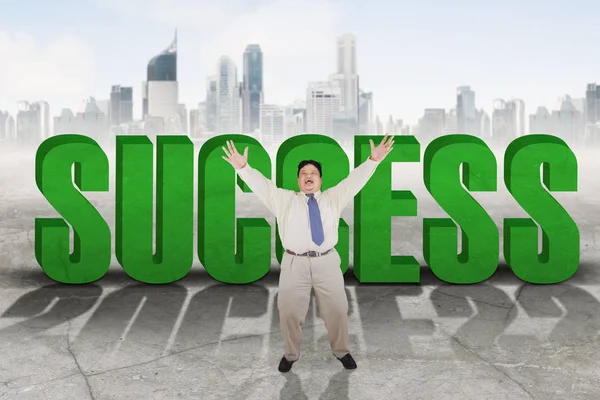 Fat businessman with success word at outdoor — Stock Photo, Image