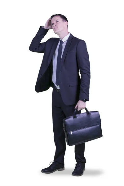 Confused American manager standing on studio — Stock Photo, Image