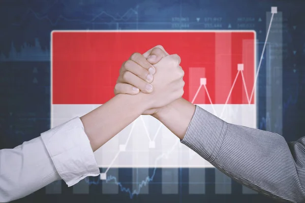 Úspěšné obchodní partner s vlajka Indonésie — Stock fotografie