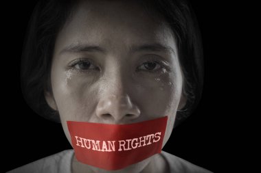 Asian woman crying with human rights text clipart