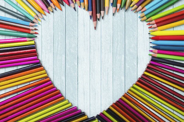 Color pencils with heart shape — Stock Photo, Image