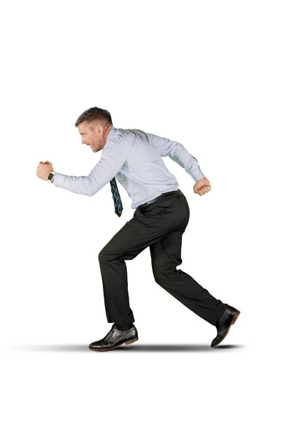Caucasian businessman running in the studio — Stock Photo, Image