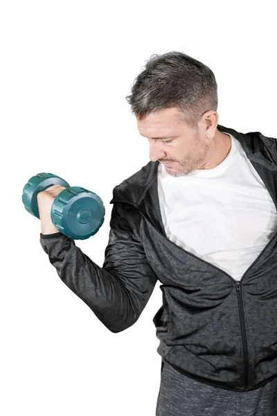 Caucasian man lifting a dumbbell on studio — Stock Photo, Image