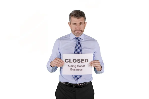 Broke caucasian businessman with out of business sign isolated over white background — Stock Photo, Image