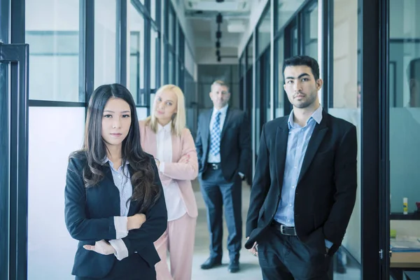 Confident multiethnic business people standing — Stock Photo, Image