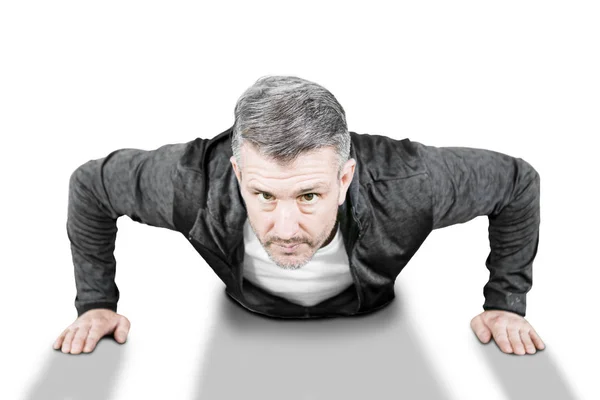 Caucasian man doing push-ups isolated over white — Stock Photo, Image