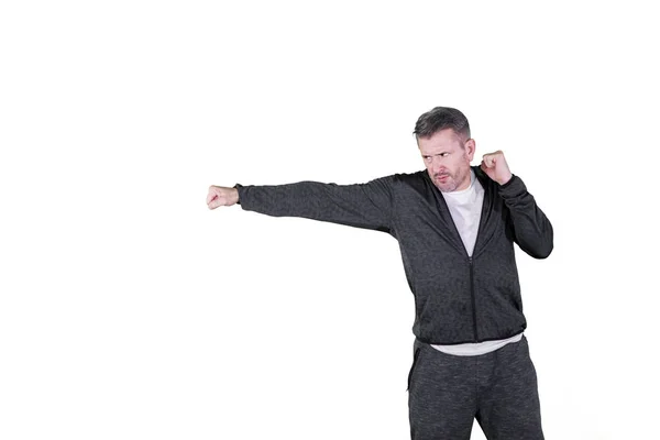 Caucasian man gives a punch isolated over white — Stock Photo, Image