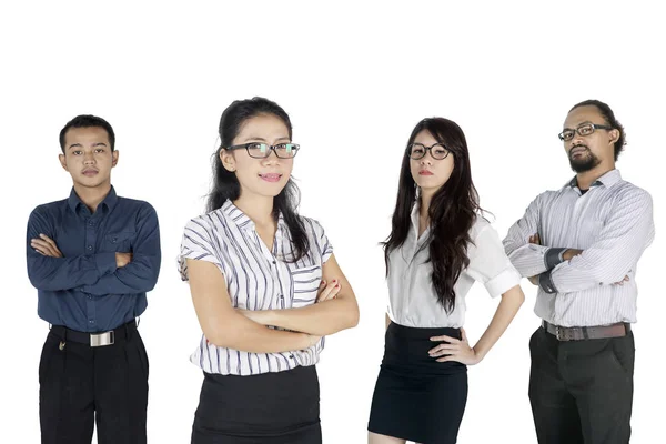 Four business people crossing their arms proudly — Stock Photo, Image