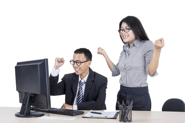 Asian business couple cheering for finished tasks — 스톡 사진
