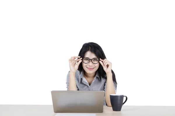 Asian businesswoman posing by holding her glasses — Stock Photo, Image