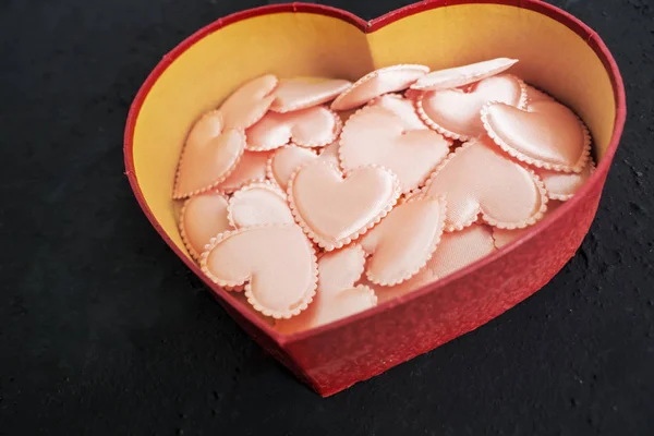 Love knick knacks inside a valentine box — Stock Photo, Image