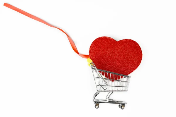 Love shape with a ribbon on a trolley — 스톡 사진