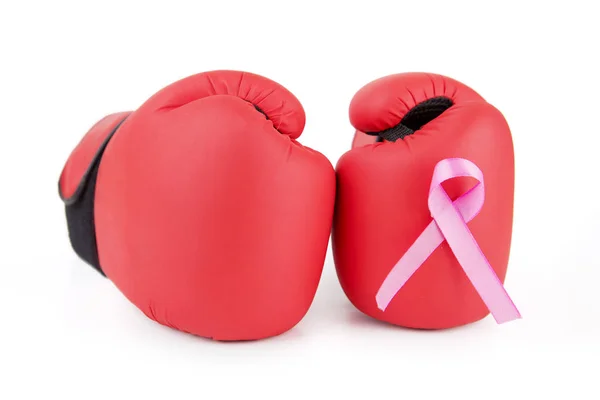 Pair of boxing gloves with pink ribbon attached to — Stock Photo, Image