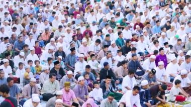 JAKARTA - Indonesia. February 14, 2020: Hundred of Muslim people praying together while celebrating Eid Al Fitr day