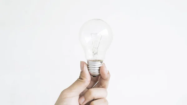 Closeup Hand Holding Light Bulb Isolated White Background — Stock Photo, Image