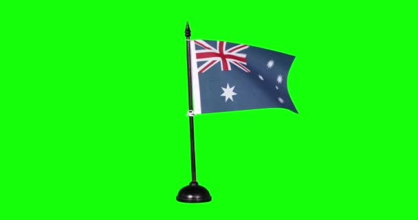 Σημαία Μινιατούρα Της Αυστραλίας Κυματίζει Ένα Κοντάρι Σημαίας Πράσινο Φόντο — Αρχείο Βίντεο