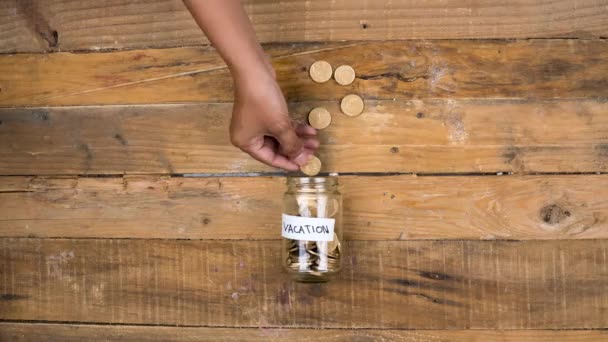 Stop Motion Unknown Hand Puts Coins Jar — Vídeo de stock