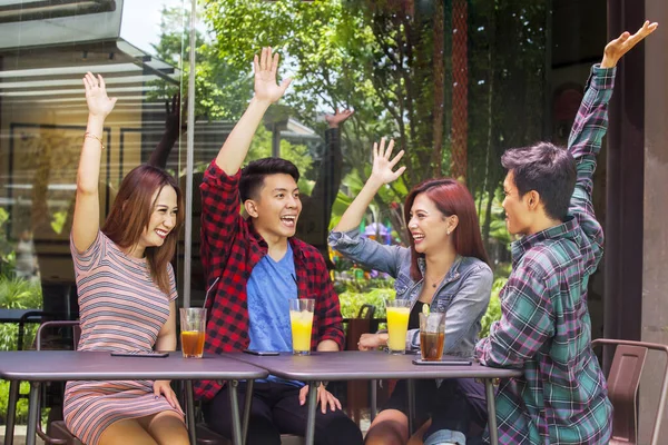 Joyful Young People Joining Hands Together While Sitting Restaurant Cafe — Stock Photo, Image