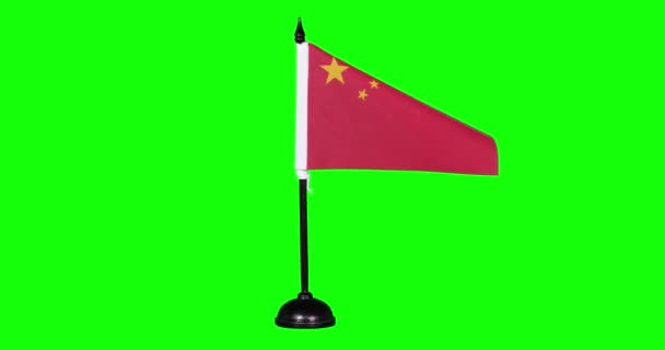 中国国旗在风中飘扬 绿色背景 — 图库视频影像