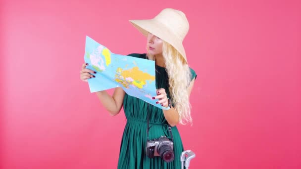 Pretty Tourist Holding Map While Standing Studio Red Background — Stock Video