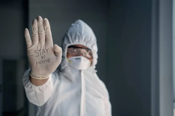 Closeup Man Wearing Hazmat Suit While Showing His Palm Wearing — Stock Photo, Image