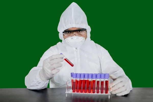 Portrait Unidentified Scientist Wearing Hazmat Suit While Holding Blood Test — Stock Photo, Image