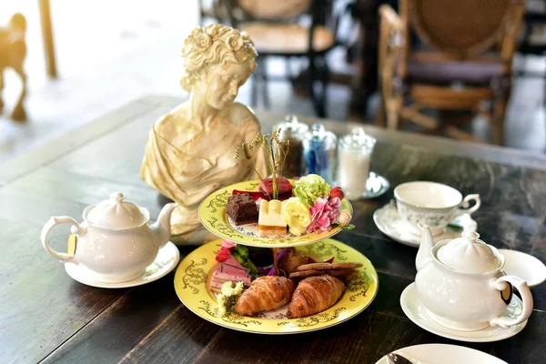 Afternoon English high tea set, Croissant and cake. — Stock Photo, Image