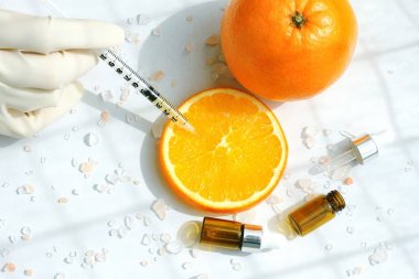 Doğal C vitamini güzellik ürün kavramı, organik portakal çıkarma ilaç cilt bakımı için.