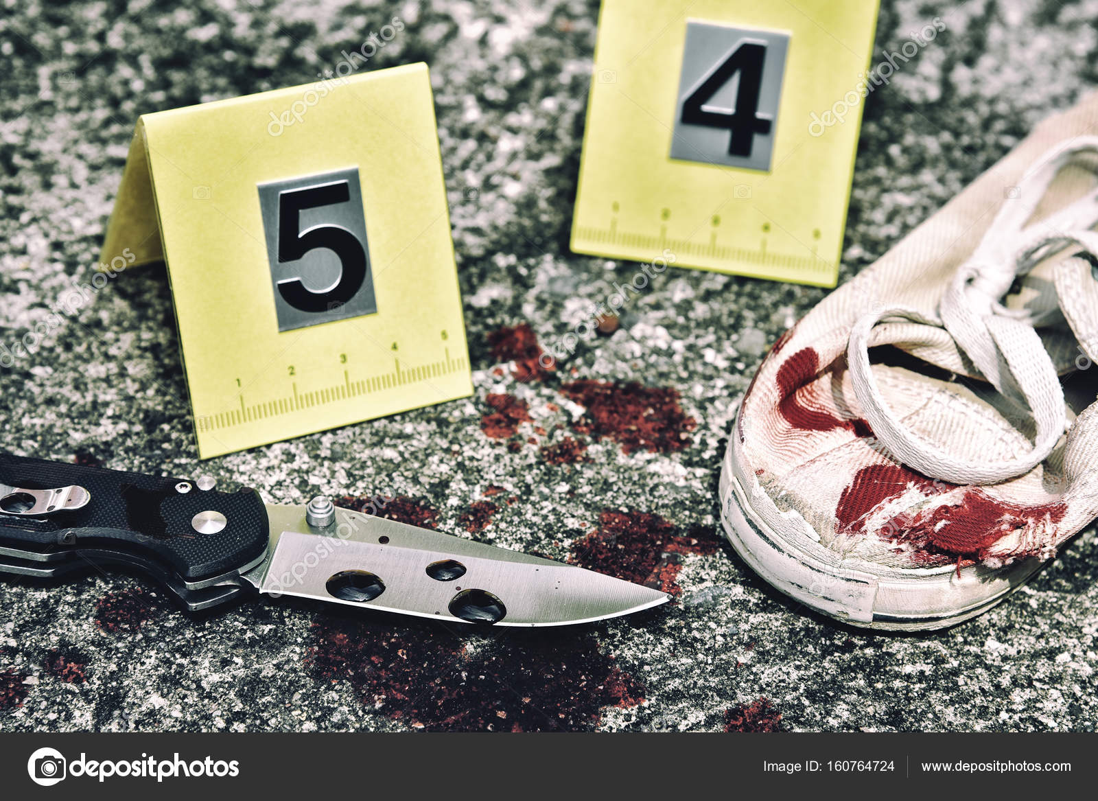 Crime scene investigation, knife and victim's shoes with criminal markers ground, Homicide Stock Photo by ©Artfully79 160764724
