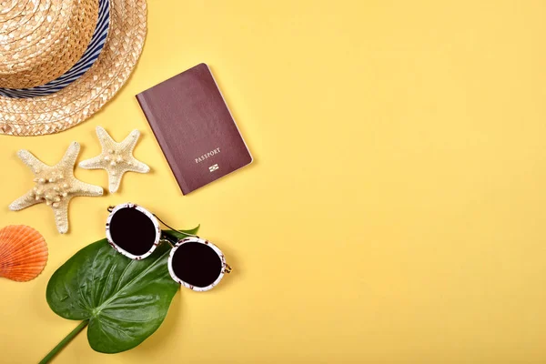 Summer travel essentials preparation with copy space, Travel accessories, Passport, Sunglasses and straw hat.