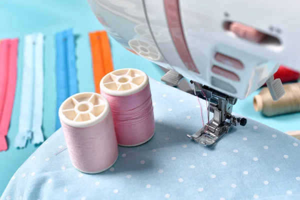 Pastel color background, Dressmaker and designer desk, Close up foot of sewing machine and handcraft accessories. — Stock Photo, Image