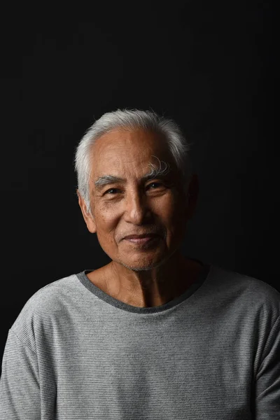 Senior asian old man, Confident and smiling elderly people on black background, Happy retiree citizen concept.