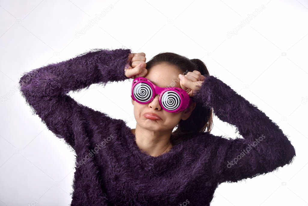 Confused and dizzy asian woman wear funny glasses, Girl's face expression feeling worry messy problems on isolated white background.