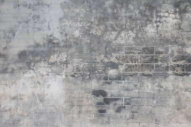 Soyut grunge ve çatlamış çimento parçacıklı duvar kağıdı arka planı, web pankartı ve tasarım şablonu için beton aşınmış yüzey.